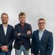 Drei Männer nebeneinander